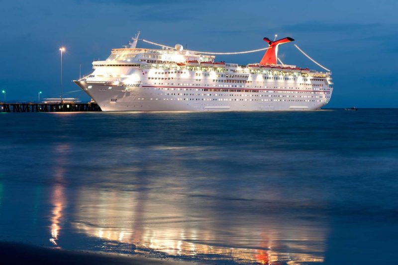 Carnival Paradise docked at night. 