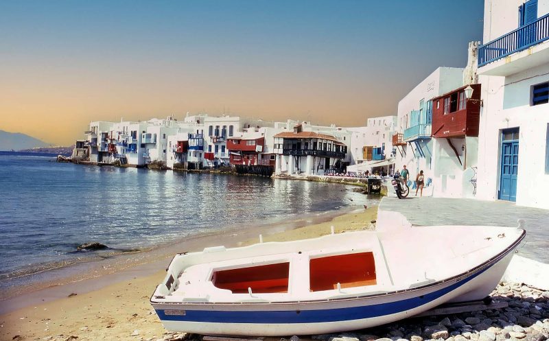 A fishing boat waits for its next outing along the waterfront of Mykonos.