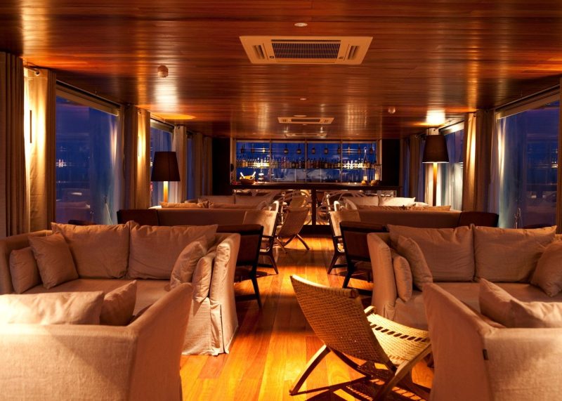 Aria's upscale lounge bar serves premium spirits and spectacular views. 