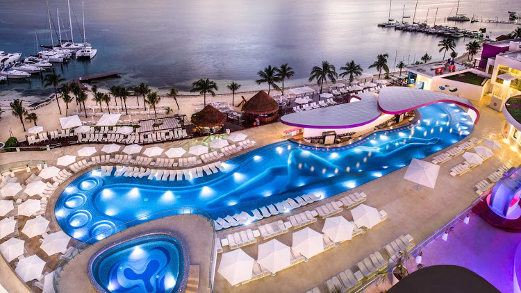A look at the Sexy Pool at dusk from the Tower at Temptation Cancun Resort.