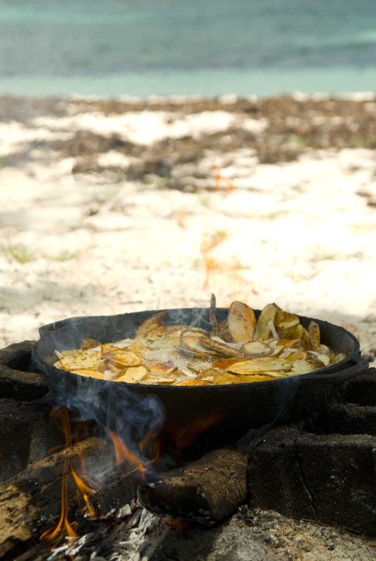 Have a tropical-style lunch on the beach while visiting the Abaco Islands in the Bahamas.
