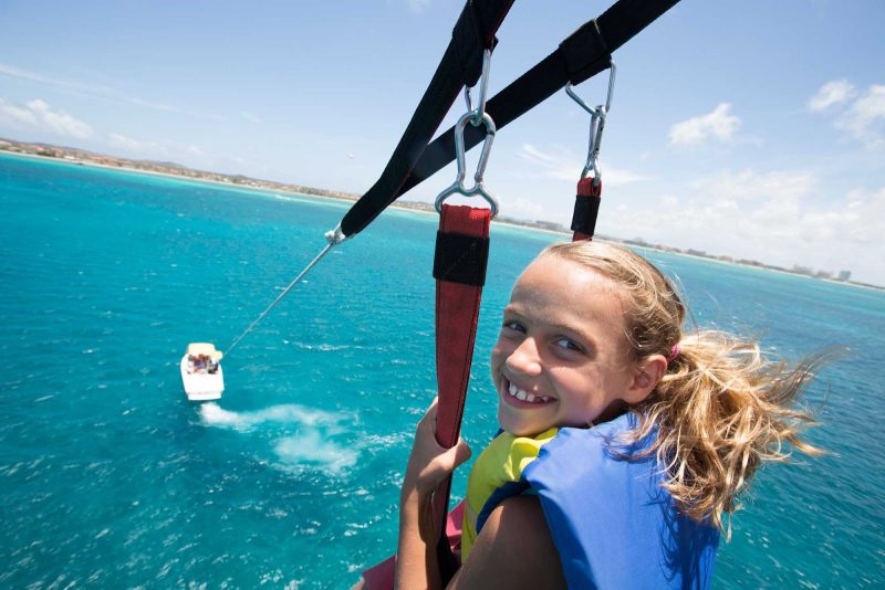 Get a bird's-eye view of Arub's beaches while parasailing.