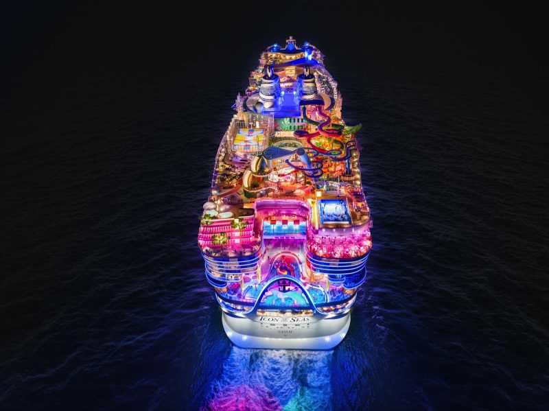 An aerial view of Icon of the Seas’ aft at night.