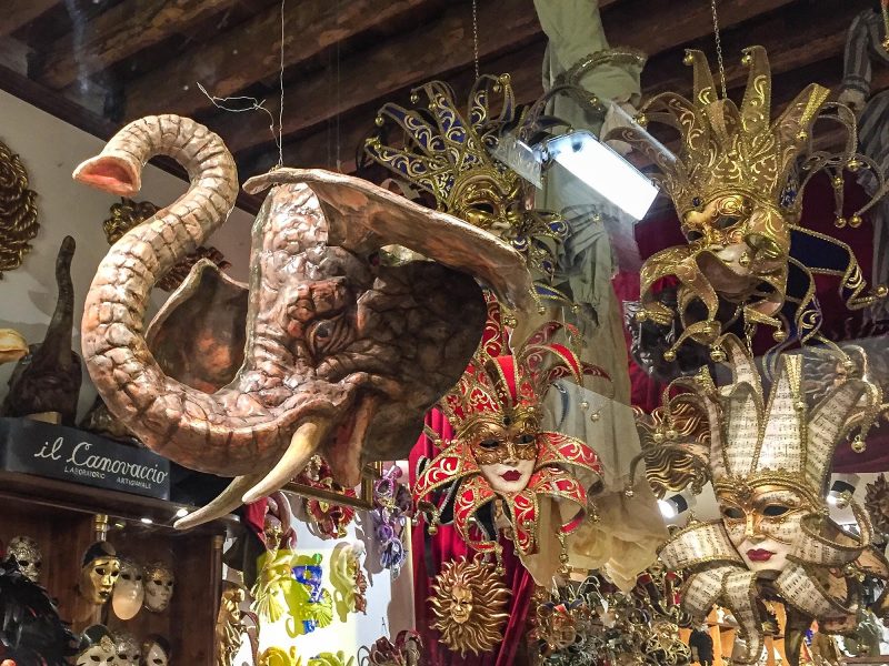 An elephant figurine and other decorations in a shop window along the Procuratie Vecchie on Piazza San Marco, Venice.