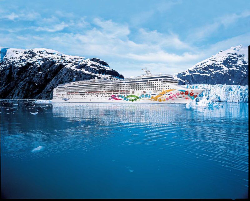 Norwegian Pearl cruising in Alaska's sparkling blue waters.