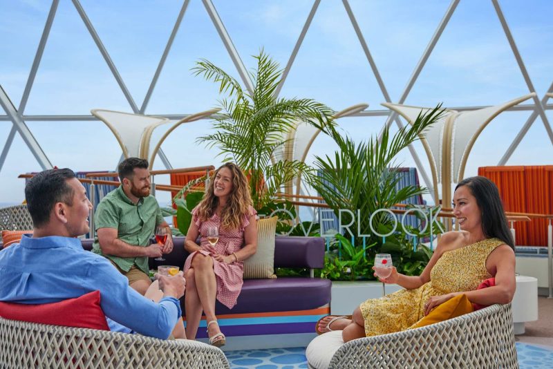 Located within the AquaDome, The Overlook is an elevated lounge area featuring cozy pods and panoramic windows.