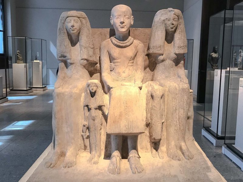 Family group of Ptah-mai, chief of the Wab-priests of Ptah, during the dynasty of Ramses II, 1213-1279 B.C., at the Neues Museum in Berlin. 