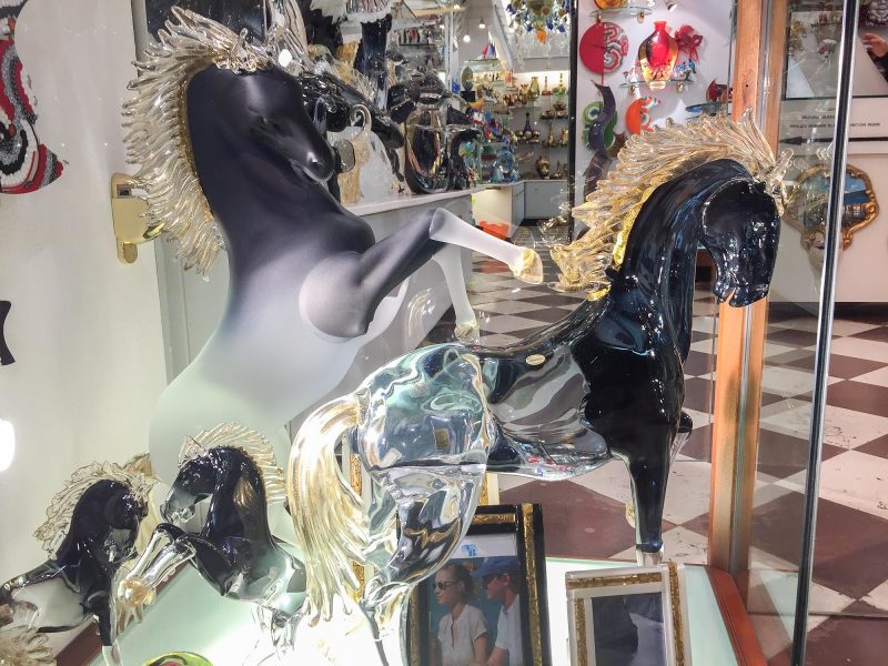 Stallions made of glass in a shop window along the Procuratie Vecchie on Piazza San Marco, Venice.