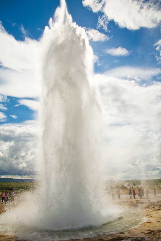 An eruption occurs at the original Geysir on the Golden Circle Route during a Lindblad Expeditions trip to Iceland.