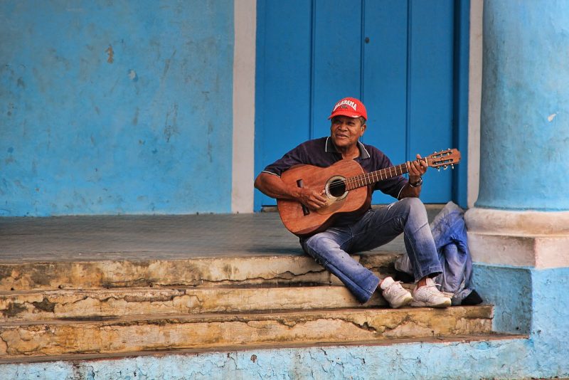 A musician performs for passersby in Havana, Cuba.