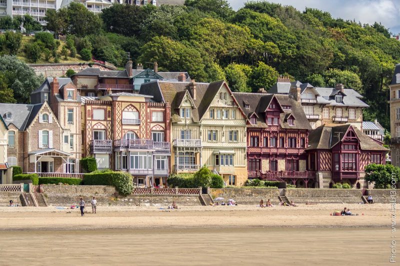 Grand old houses line the beach in Trouville sur Mer, Normandy, France.