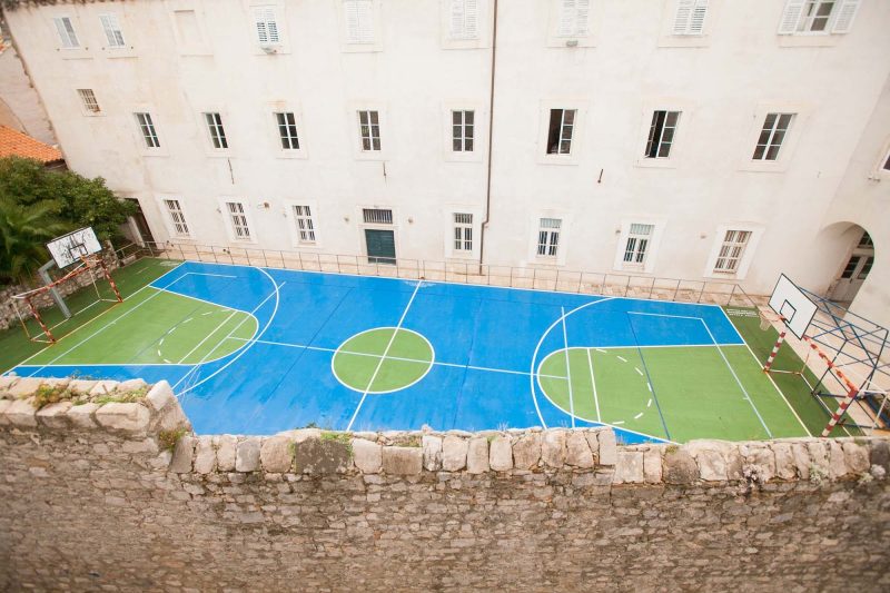 A paved basketball court provided a contrast to centuries-old buildings in Old Dubrovnik.