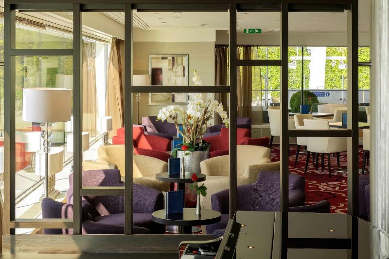The Panorama Lounge features floor-to-ceiling panoramic windows for stunning views.