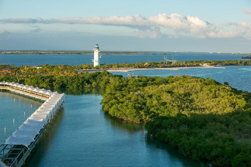 View of Harvest Caye in Belize from Norwegian Jade at sunset.
