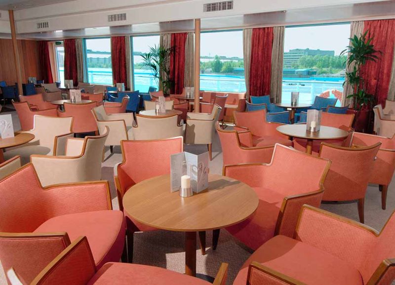 Head to the lounge on Viking Truvor to take in the scenery Russia has to offer.