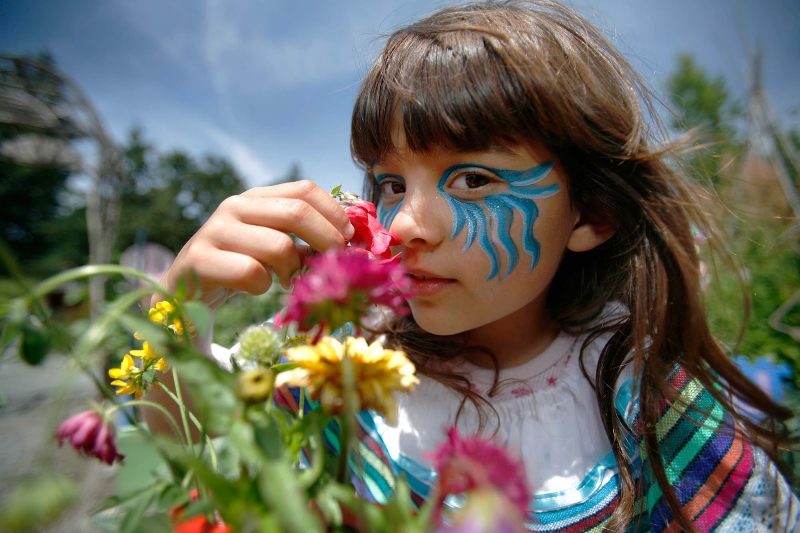 A girl at Glendale Gardens in Victoria. You'll find the Organic Islands Festival there each July.