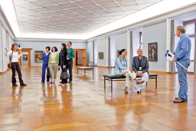 Visitors inspect a contemporary art show at the Aschaffenburg Museum during a Uniworld cruise on Germany's Main River.