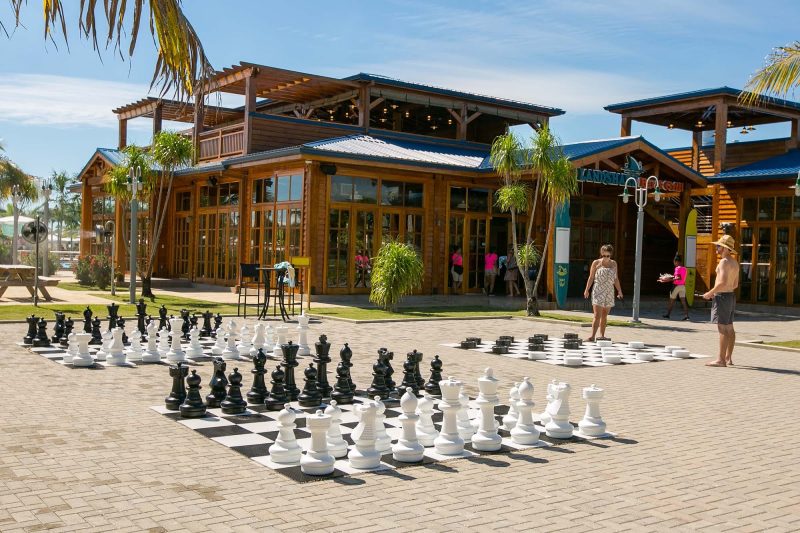 Guests can play on oversize checkers and chessboards at Harvest Caye in Belize.