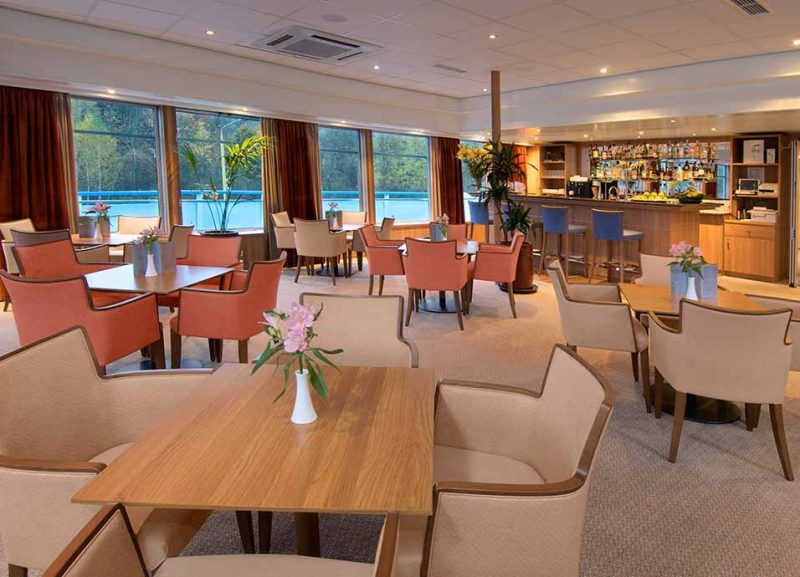Head to the lounge on Viking Truvor to take in the scenery Russia has to offer.