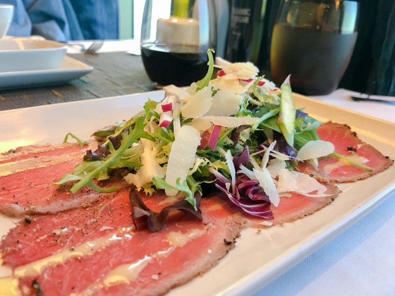 Beef carpaccio with Grana Padano shavings at Canaletto on ms Oosterdam.