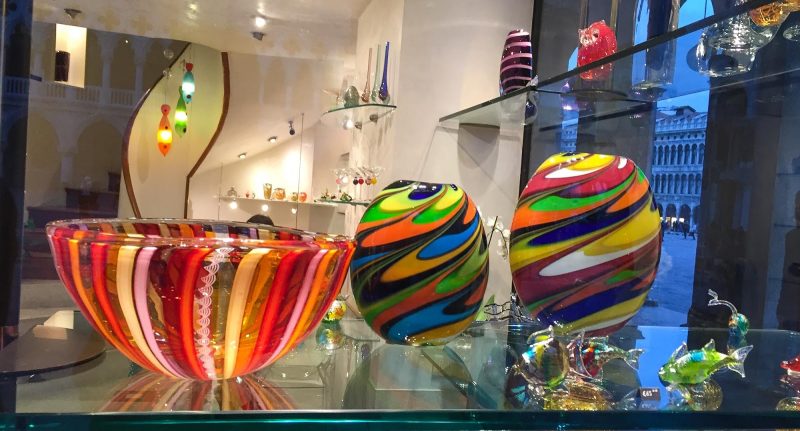 Decorative home furnishings in a shop window along the Procuratie Vecchie on Piazza San Marco, Venice.