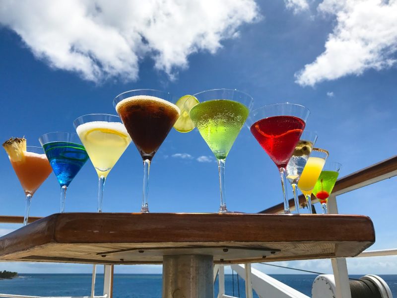 Enjoy a cocktail on deck on your next cruise.