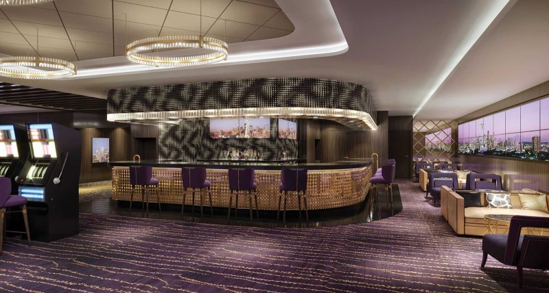 Passengers get busy in the Casino aboard Norwegian Jade.