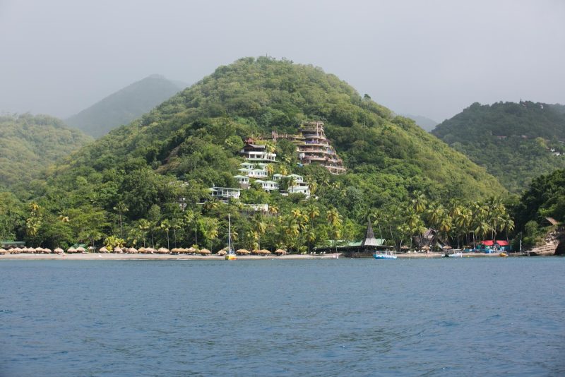Two resorts poised on a hillside along the coast of St. Lucia.
