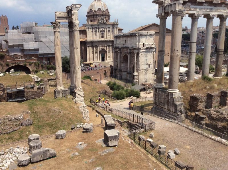 The Arch of Septimus Severus and the Temple of Saturn (built in 476 B.C.), right, at the Roman Forum.