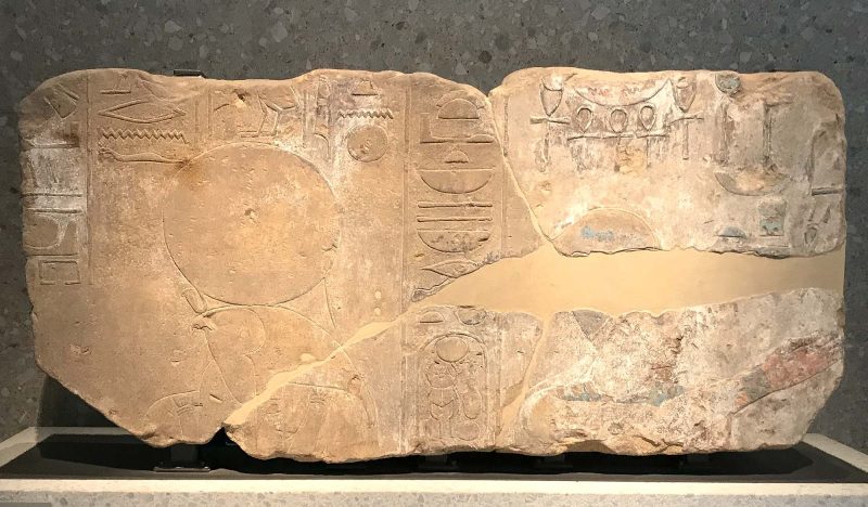 Temple relief of falcon-headed sungod Aten (lower left) and pharaoh Amenhotep IV, 1353 B.C.