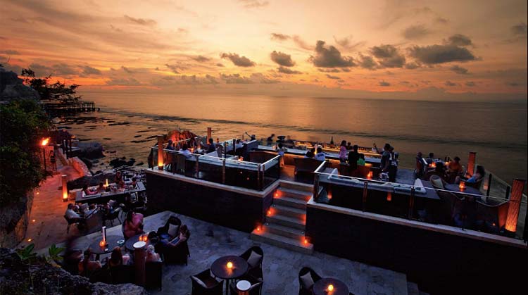 Take in the sunset and rolling waves at the Rock Bar at the Ayana Resort & Spa in Bali.