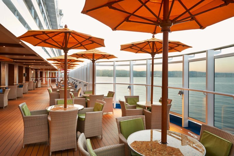 Watch the world go by in the Lanai, an outdoor promenade deck area with 60 seats on Carnival Vista.