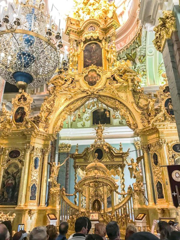 The iconostasis and chandelier at Sts. Peter and Paul Cathedral in St. Petersburg, Russia.