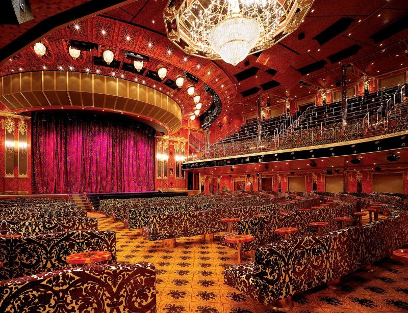Enjoy Vegas-style shows at the multilevel Amber Palace, Carnival Glory's main entertainment venue.