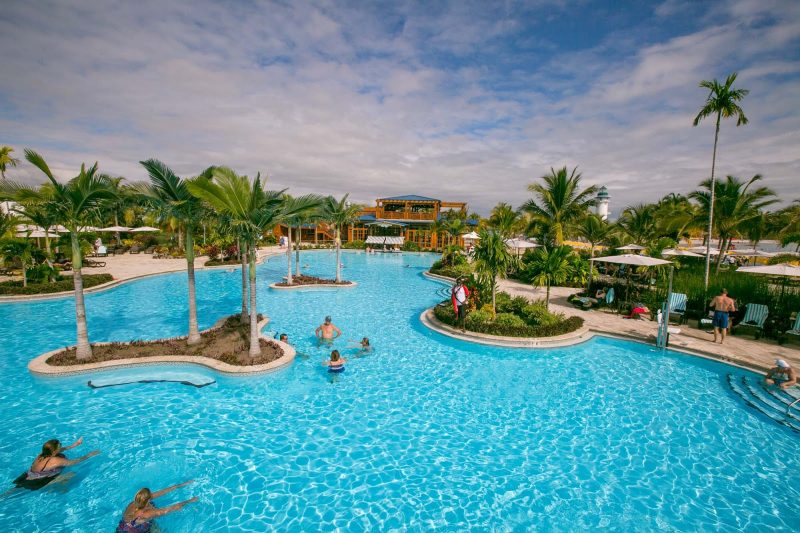 The expansive pool at Harvest Caye in Belize includes a great swim-up bar.