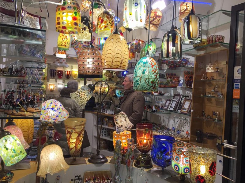 Finely decorated glass lamps in a shop in Venice.