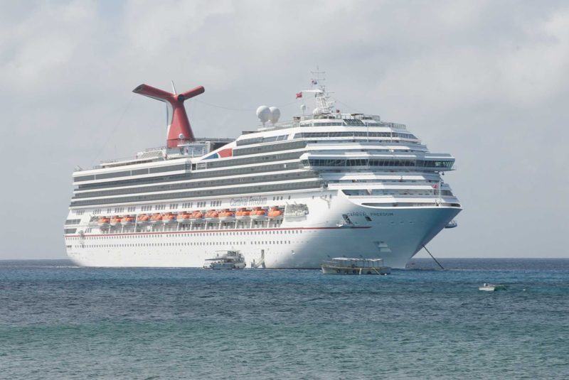 Carnival Freedom anchored off Grand Cayman Island.
