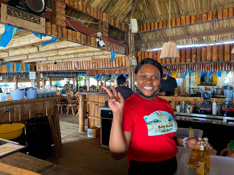 A bartender at Big Mama’s Grill at Baby Beach in Aruba. 