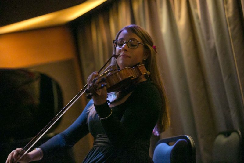 Sarah Greene on viola during a Lincoln Center Stage performance on Oosterdam.