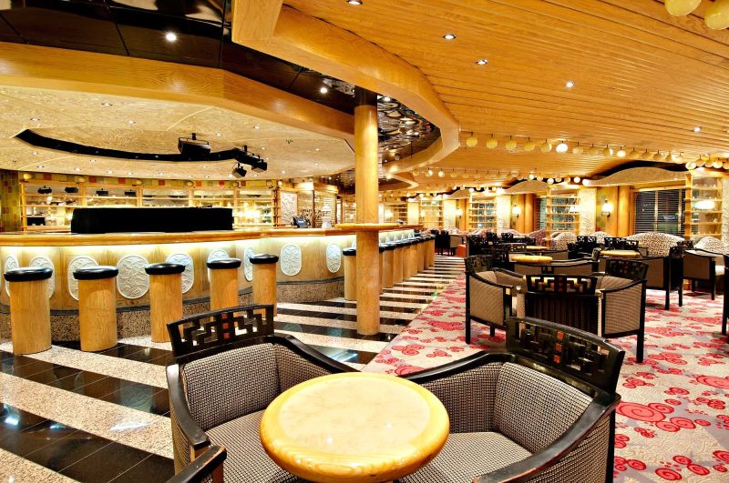 Sing along to your favorite tunes at the Ivory Piano Bar, on Carnival Pride's deck 3.