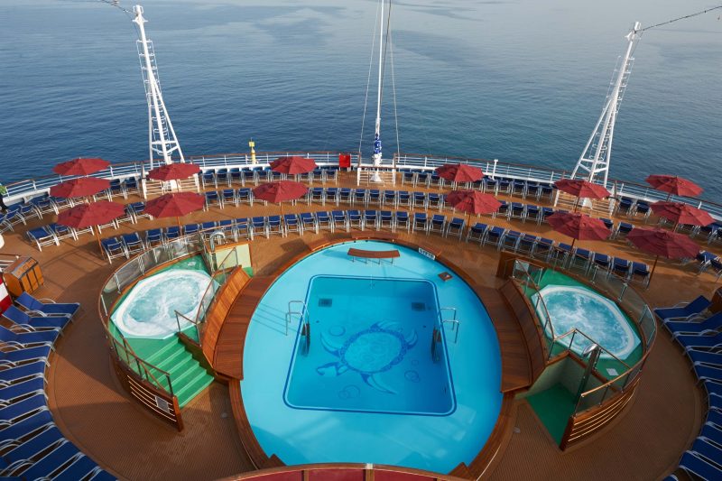 Choose the spa or the pool for a quick dip — Carnival Vista offers many activities poolside.