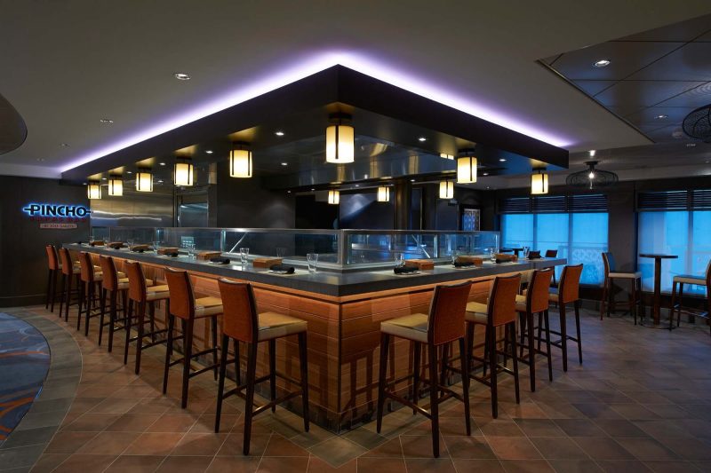 Share wine and tapas at the Pincho Tapas bar by Jose Garces aboard Norwegian Escape.