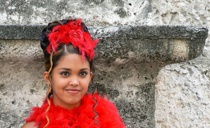 A girl dresses up for a festival in Cuba.