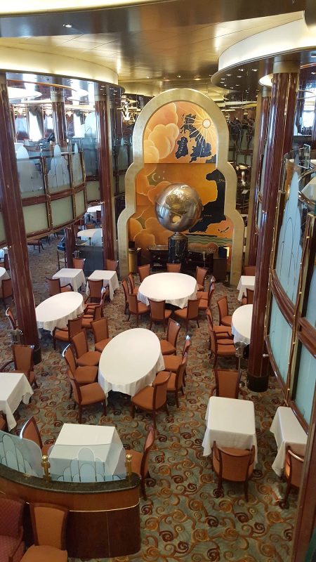 Britannia Restaurant, on decks 2 and 3, is Queen Victoria's largest restaurant, a stylish space with intimate table groupings framed by tall cornices.