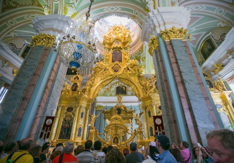 Crowds gather in front of the sanctuary at Sts. Peter and Paul Cathedral in St. Petersburg, Russia.