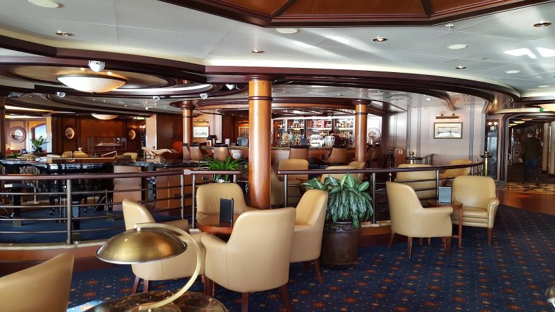 The Commodore Club on deck 10 is an observation lounge offering sweeping views over the bow of Queen Victoria.