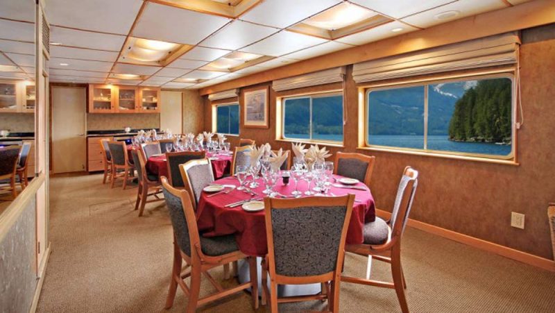 Enjoy plated service and complimentary wines in the dining room of Safari Quest.