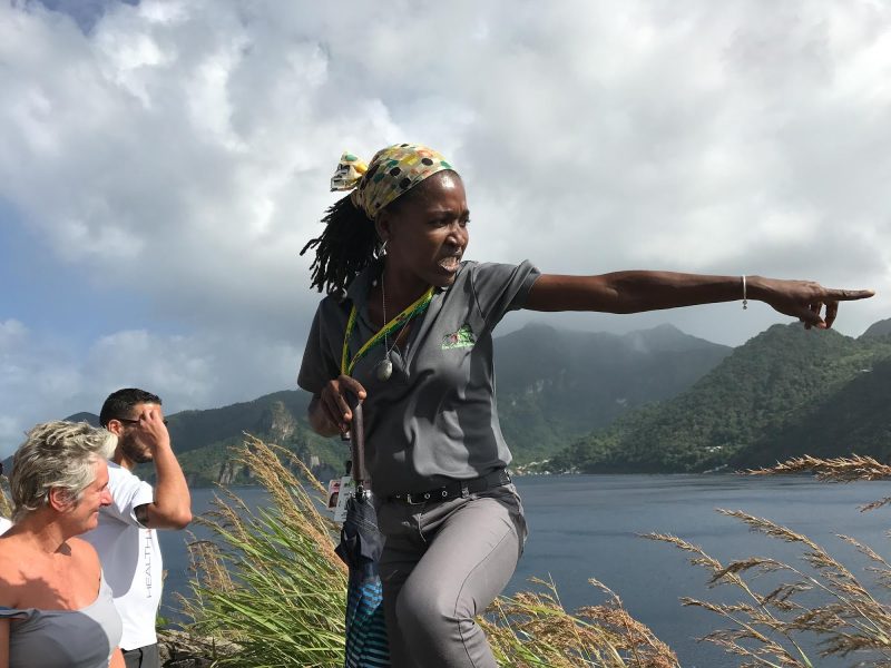 A tour guide points out an attraction at Scott's Head on the south end of Dominica.