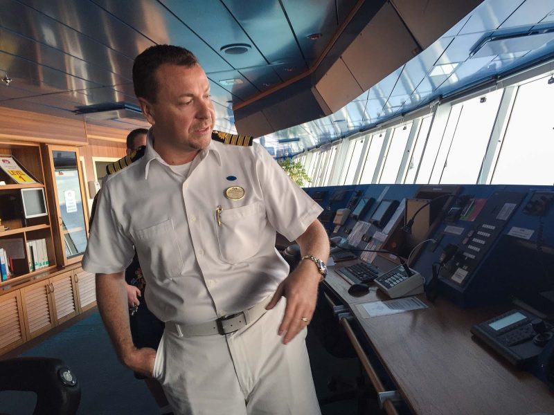 The captain of Ruby Princess on the ship's bridge.