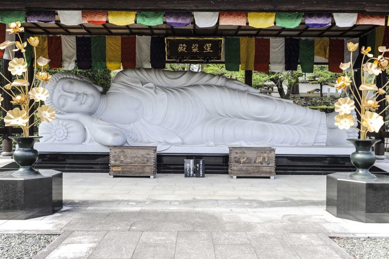 Visit Japan on a Ponant cruise to see reclining Buddhas and other shrines.